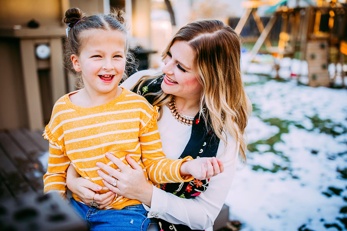 Mom hugging child