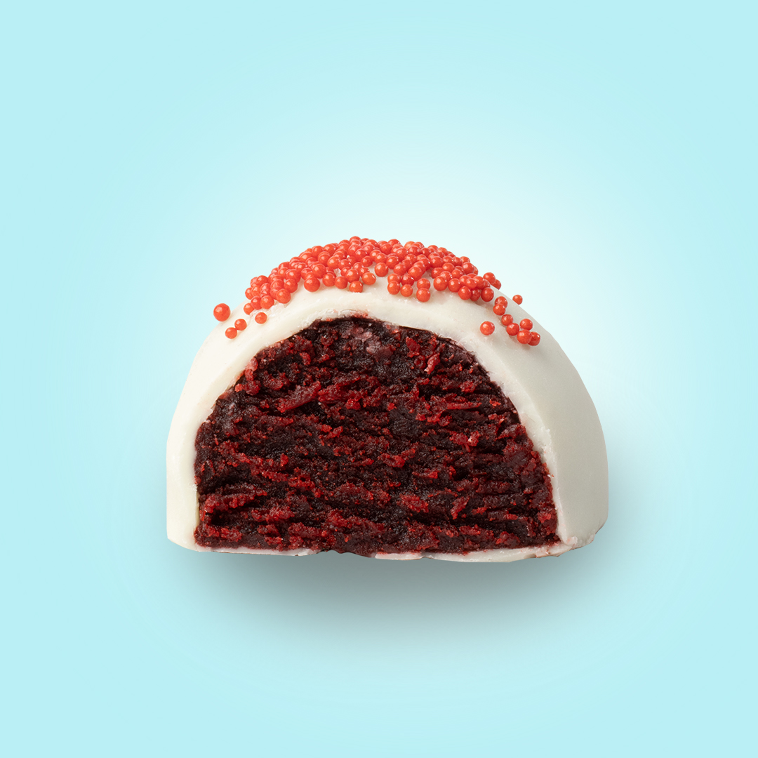 Red velvet cake bite with red sprinkles