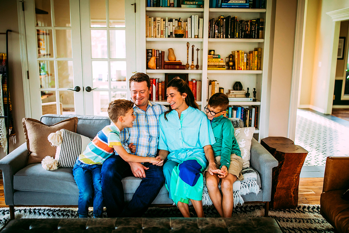 Family sitting on couch