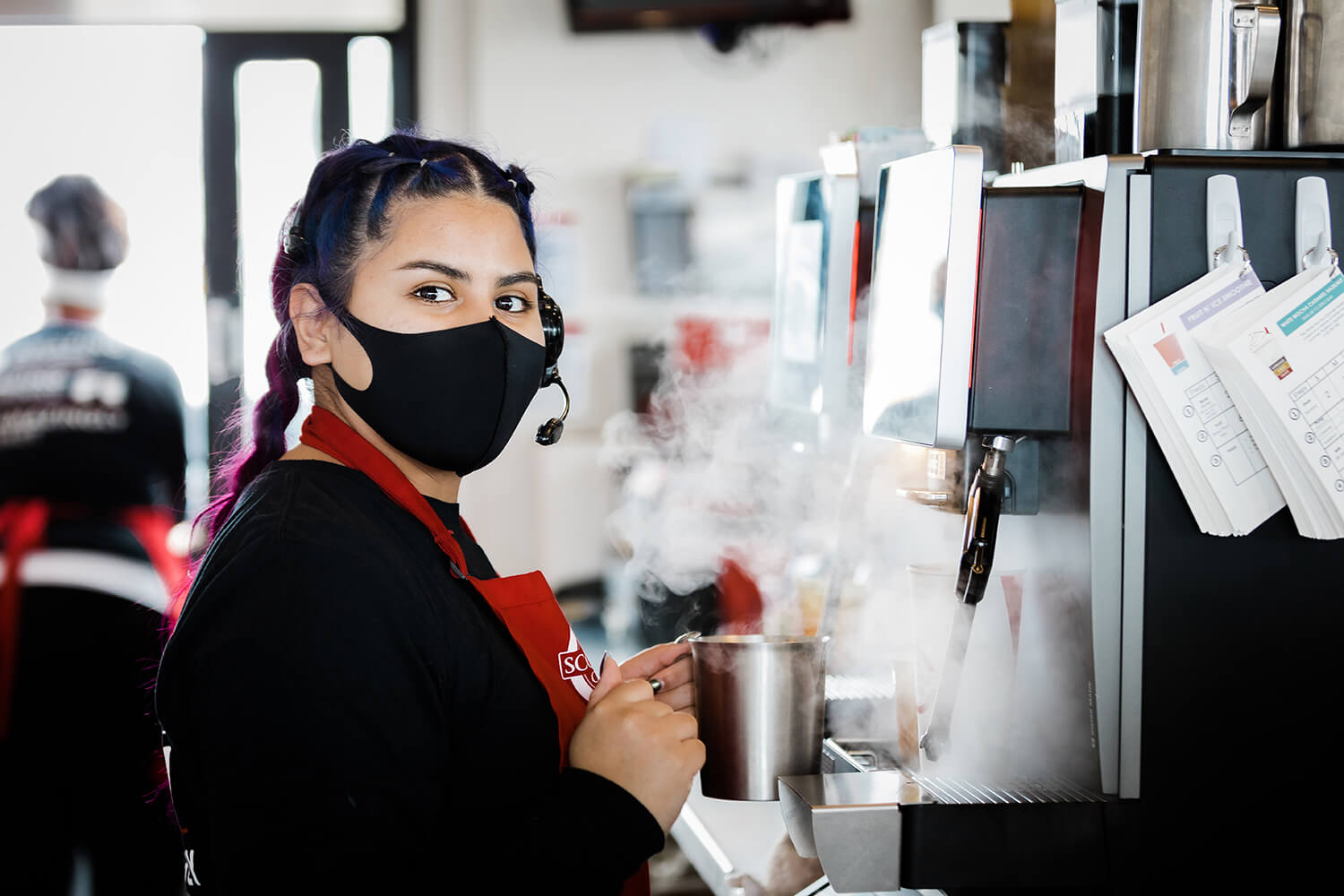 Barista looking at camera