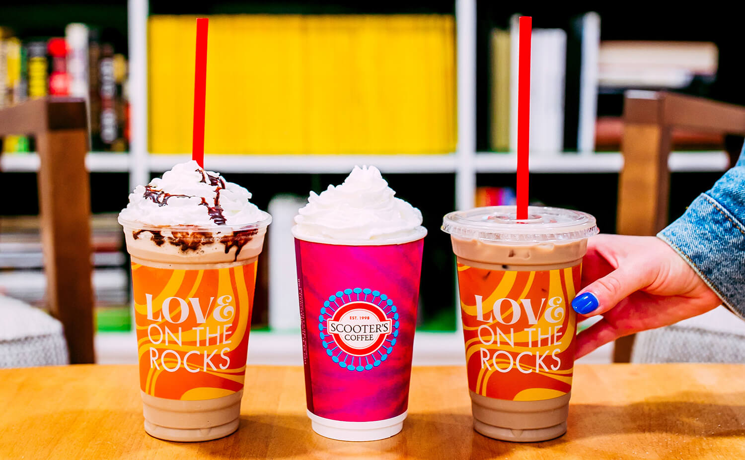 Three coffee drinks on table